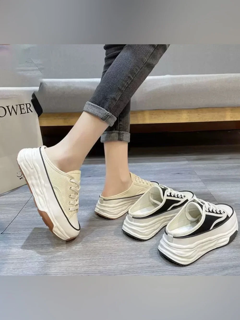 Women’s Black and Cream Slip-On Canvas Sneakers